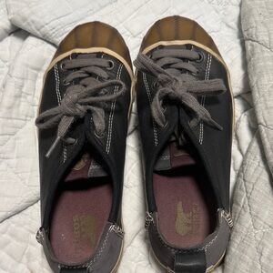Black and Brown Sorel sneakers
Size 8